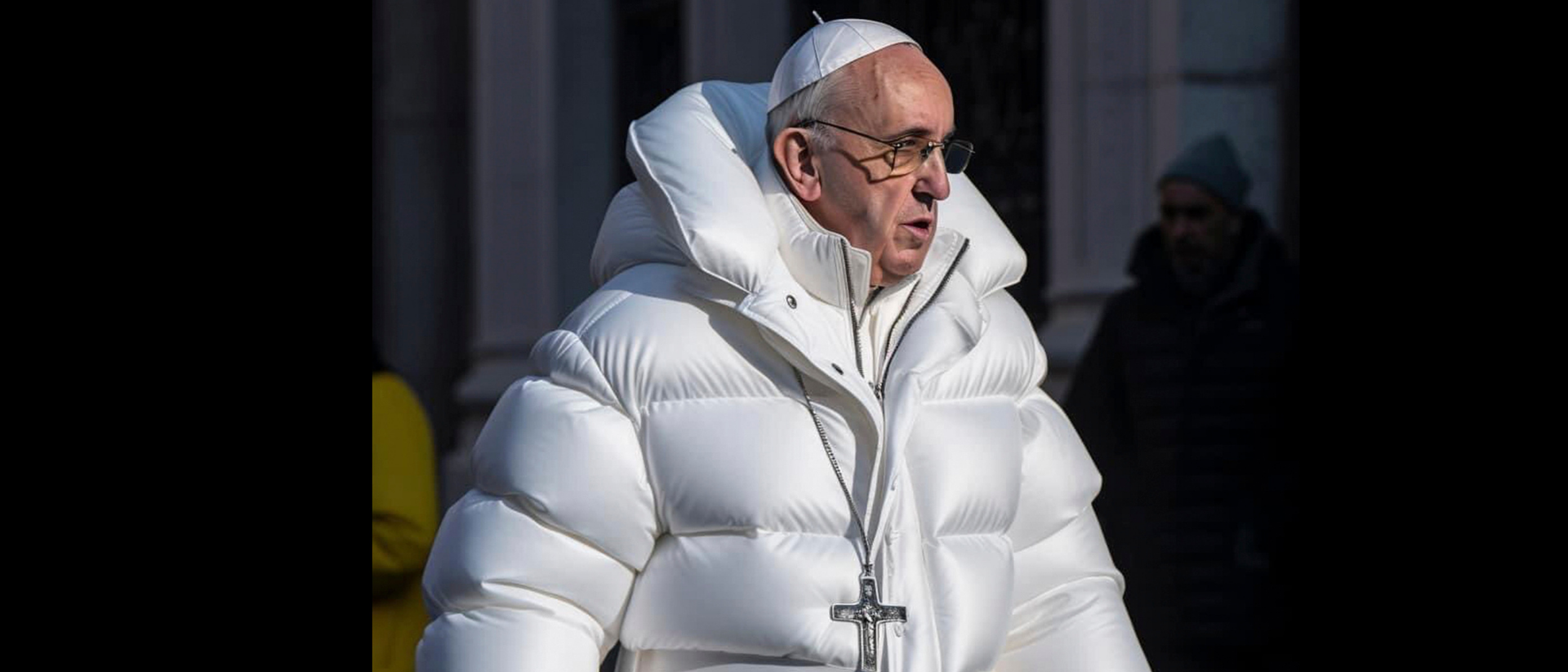 Pabst Franziskus mit einer dicken weißen Steppjacke bekleidet