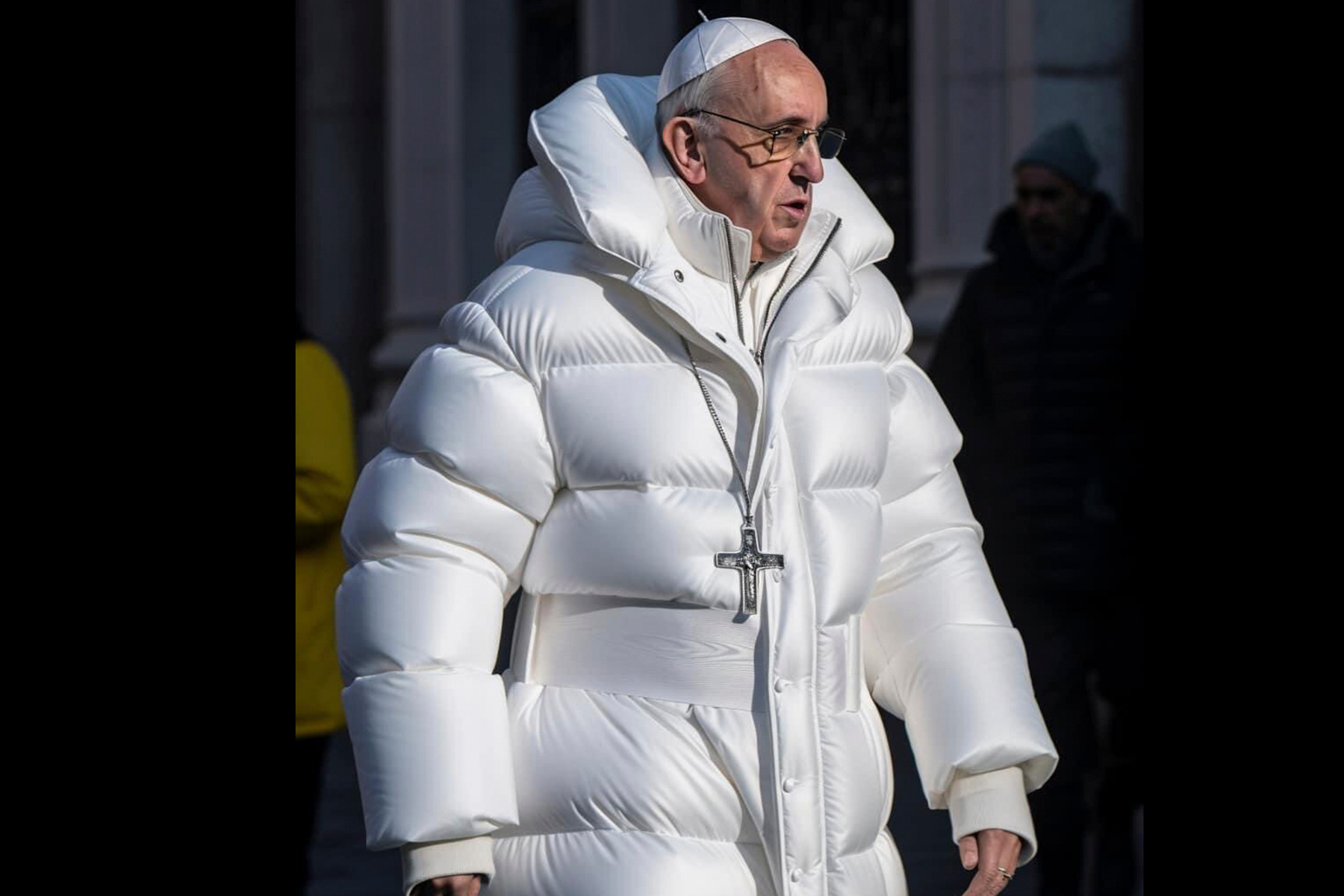 Pabst Franziskus mit einer dicken weißen Steppjacke bekleidet